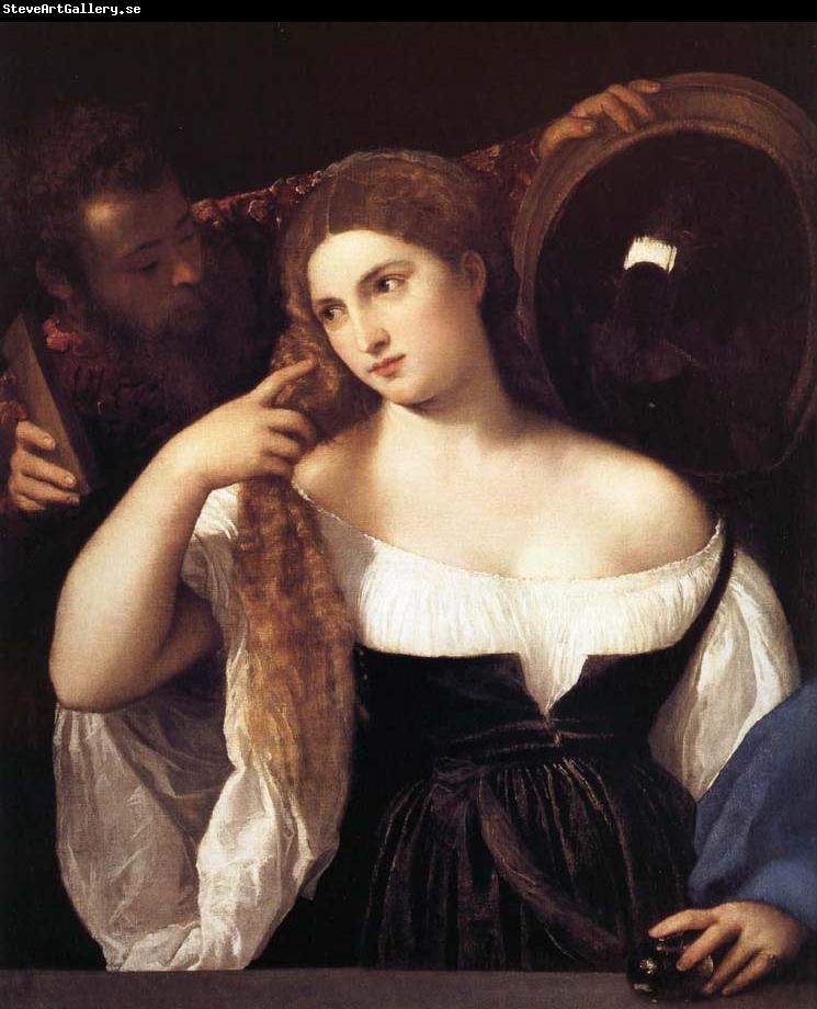 TIZIANO Vecellio Portrait d'une femme a sa toilette